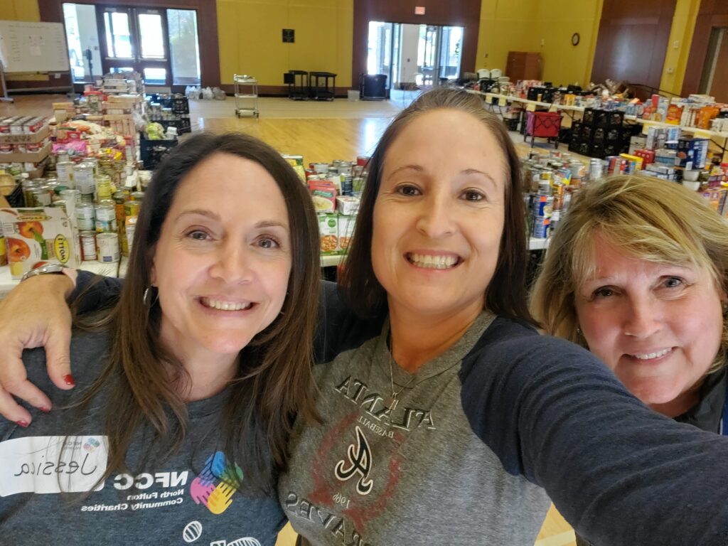 Sandy Holiday with staff members Jessica Heidish and Becky Cottingham at our Thanksgiving program